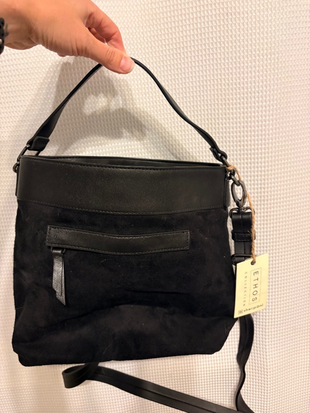 Women’s black suede bag
